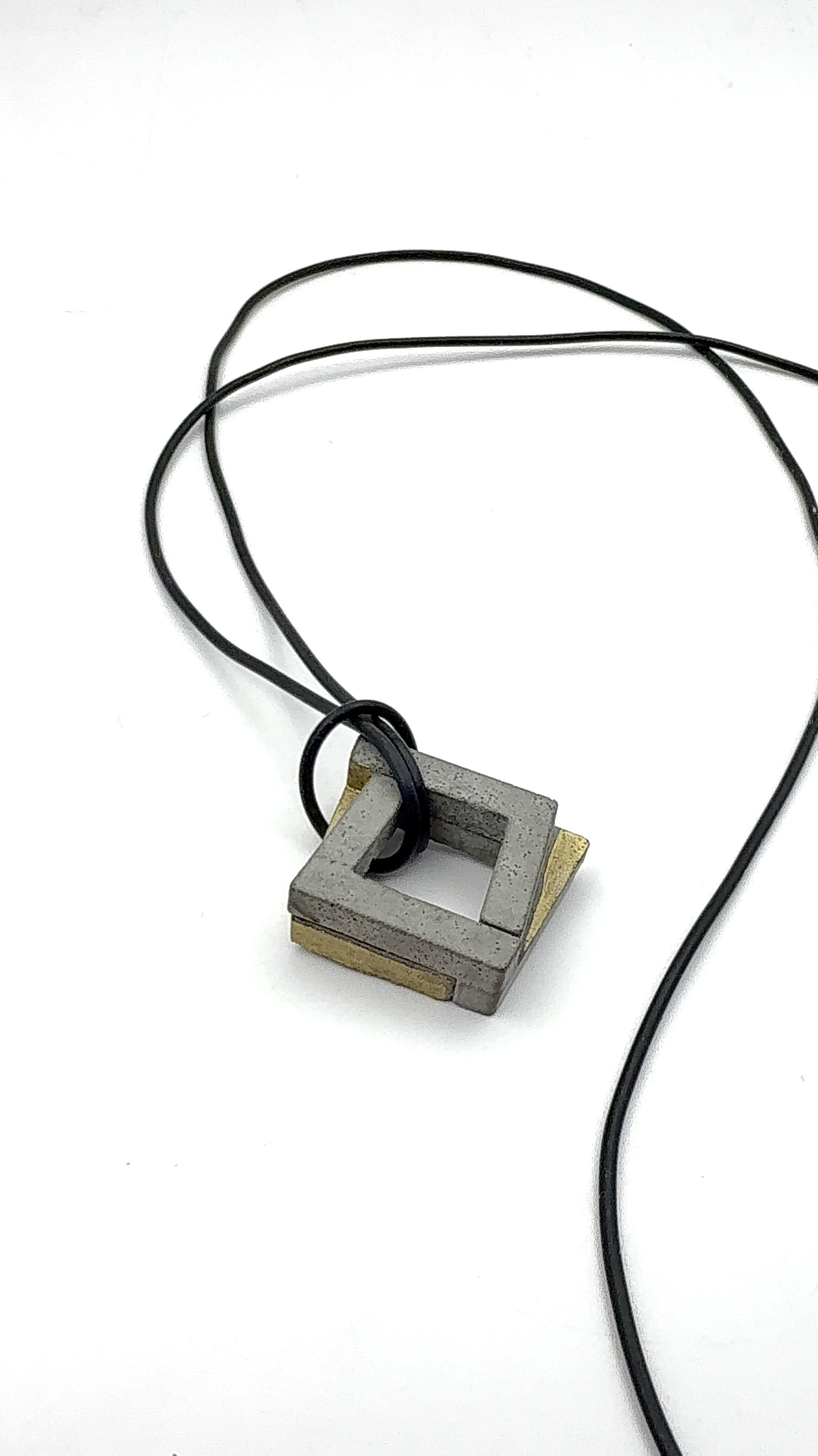 Long concrete pendant