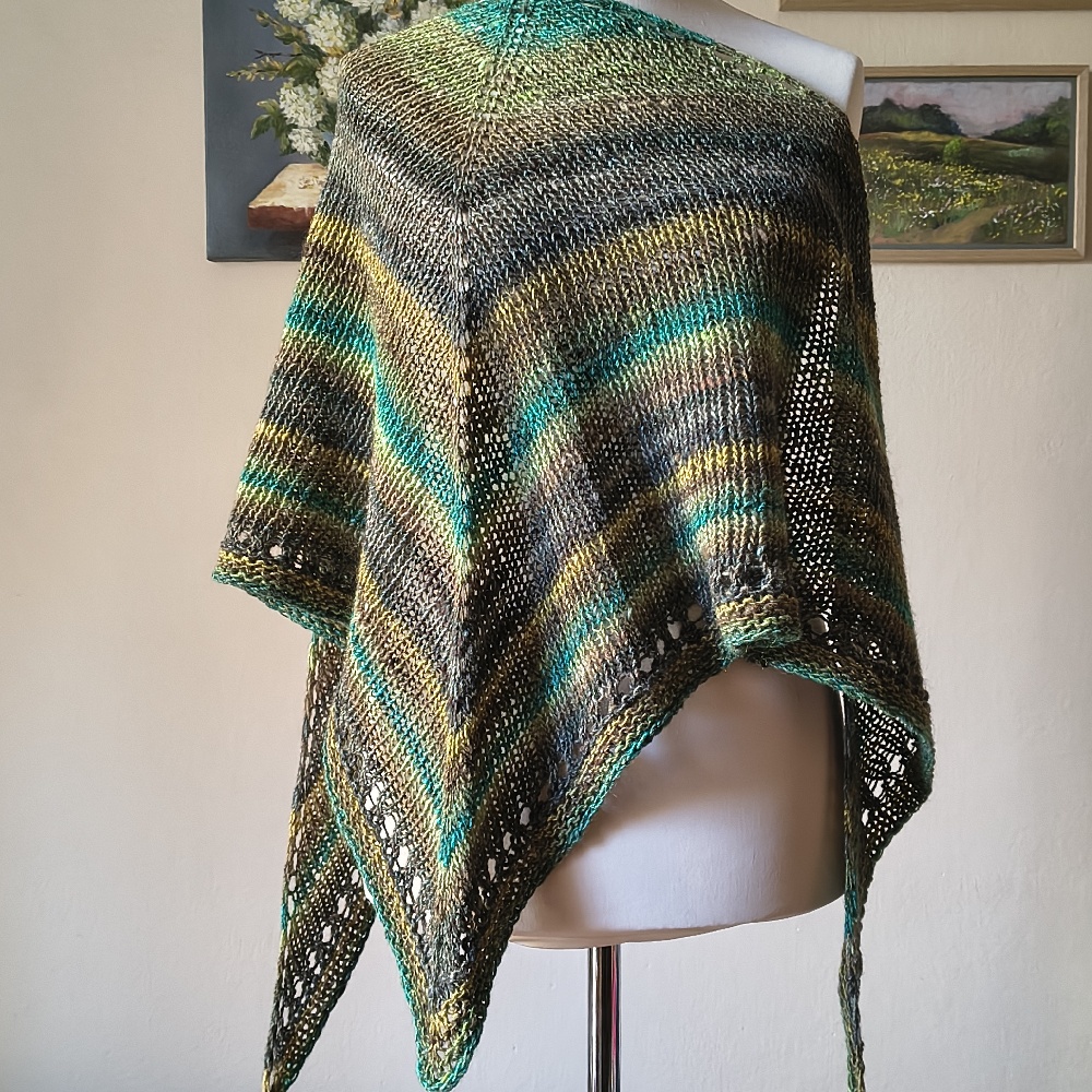A unique scarf made from 100% of the finest Japanese Noro yarn.