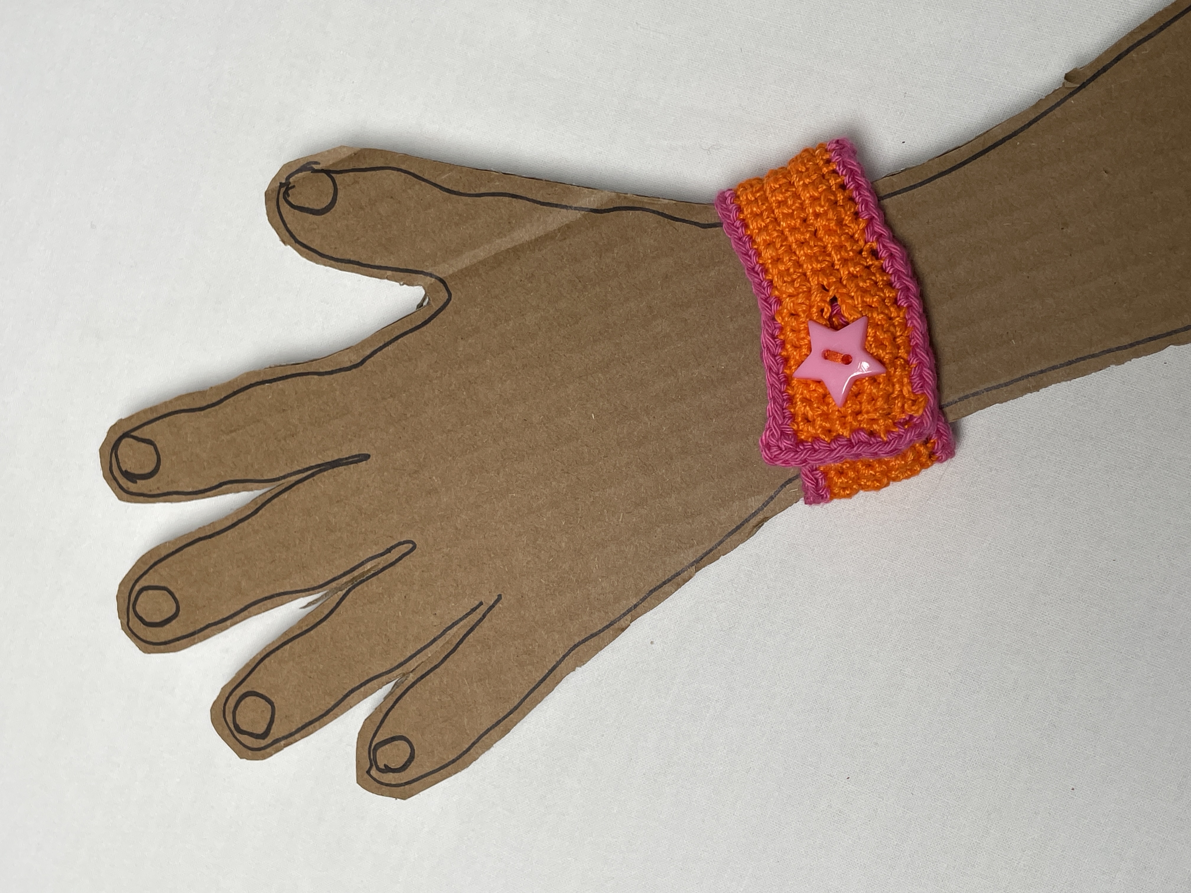 Crochet wristband, orange and pink, photo 3