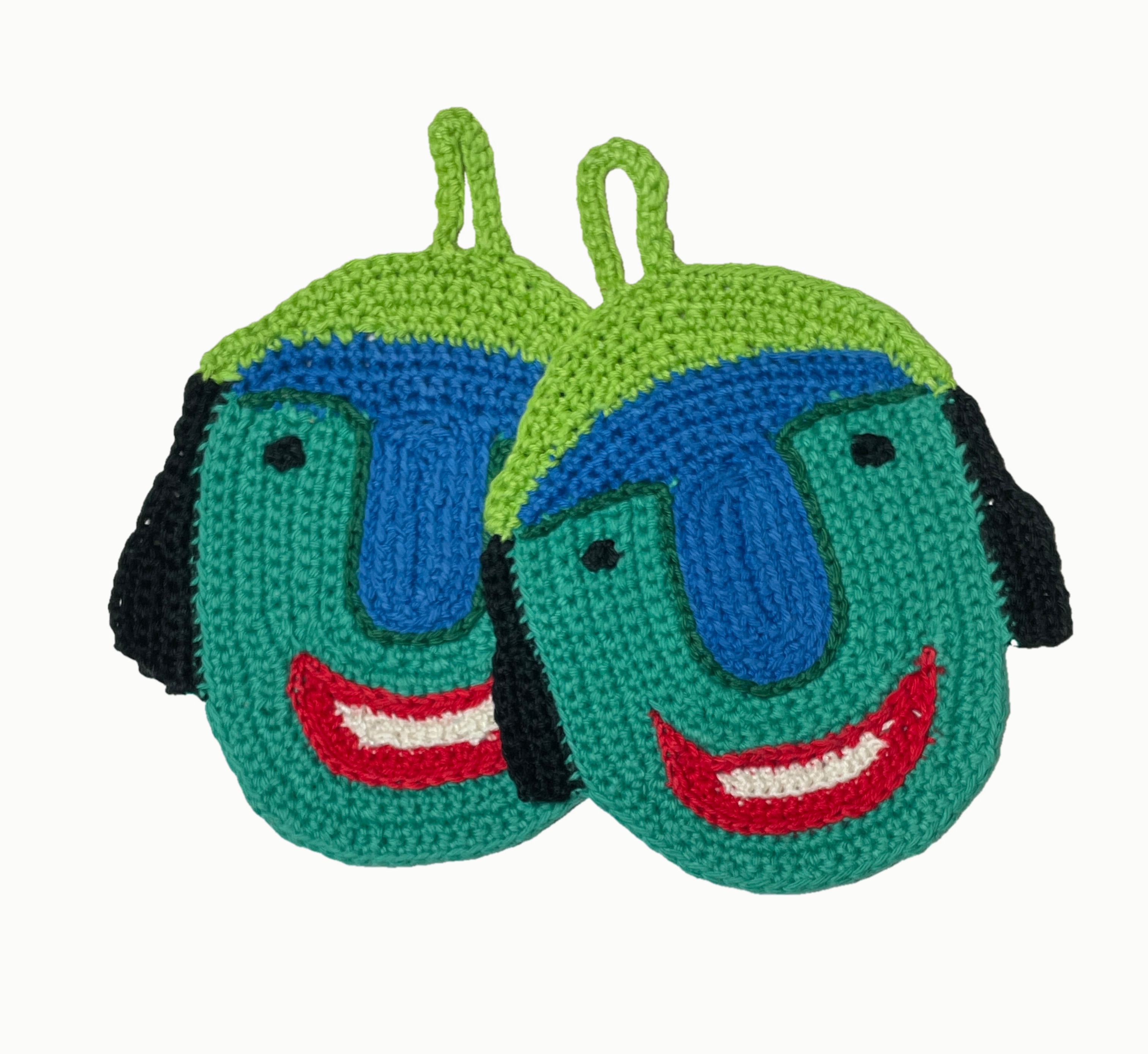 Colorful crochet potholders, blue and green