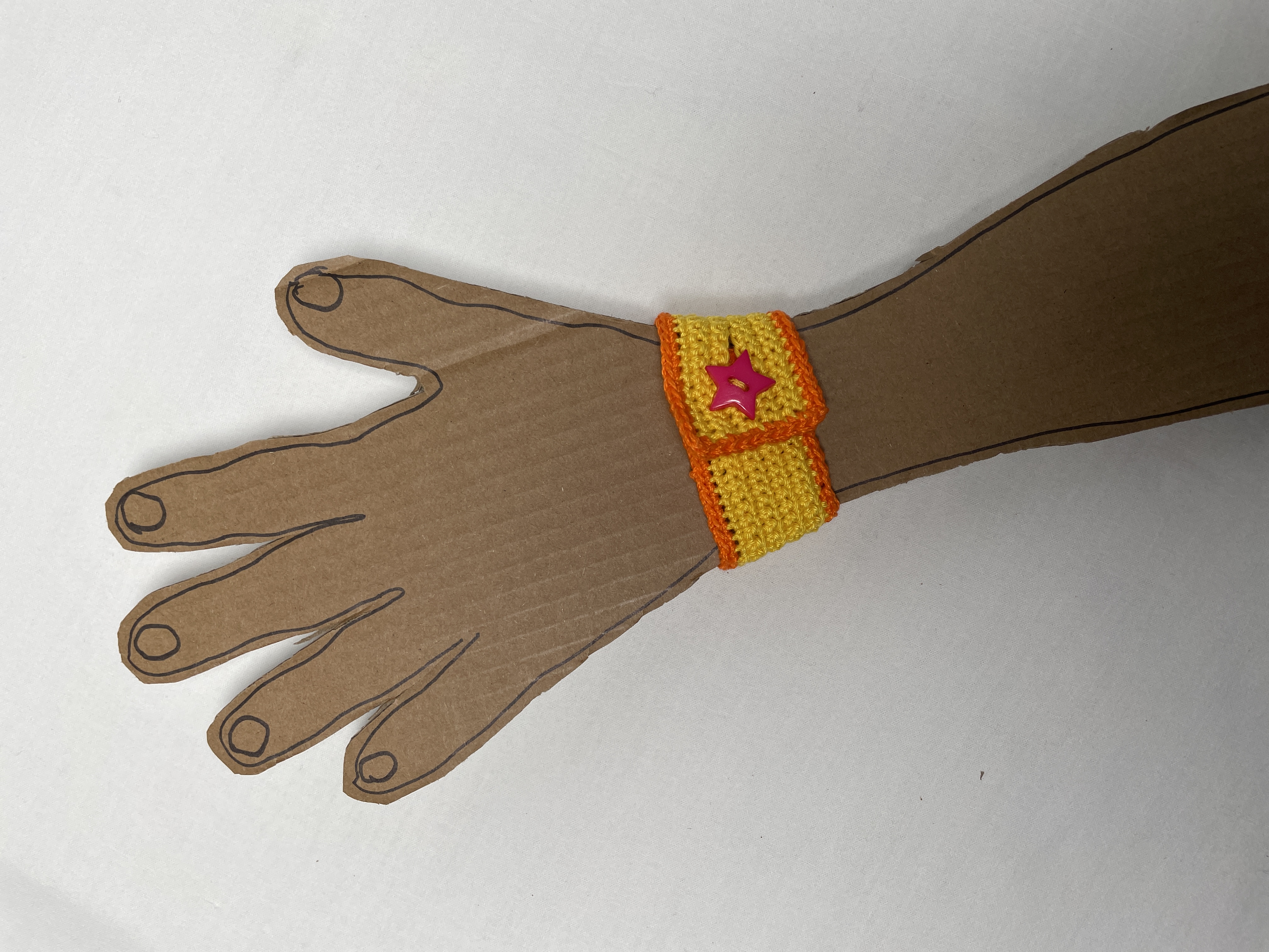 Crochet wristband, yellow and pink, photo 2