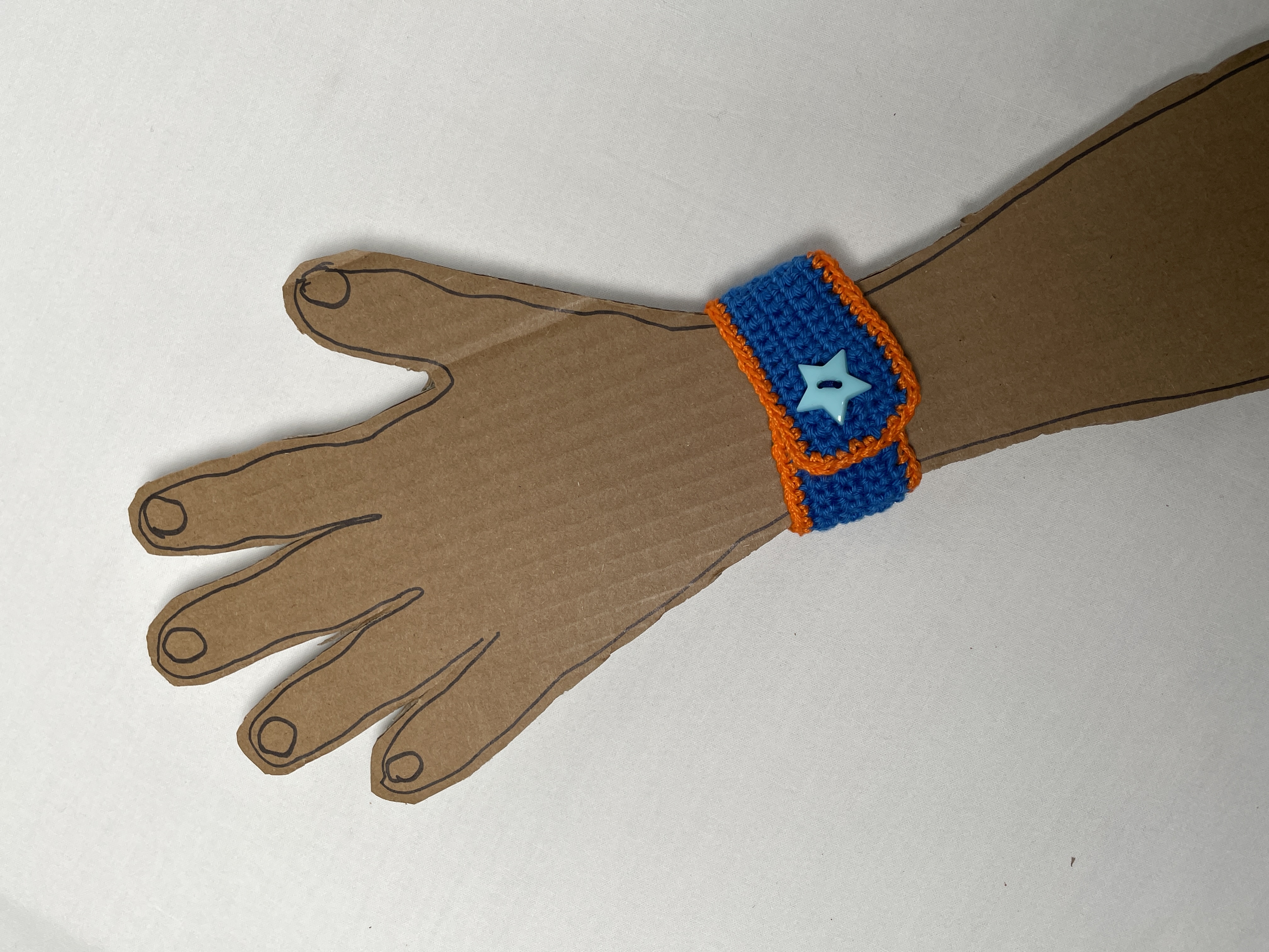 Crochet wristband, blue and orange, photo 3