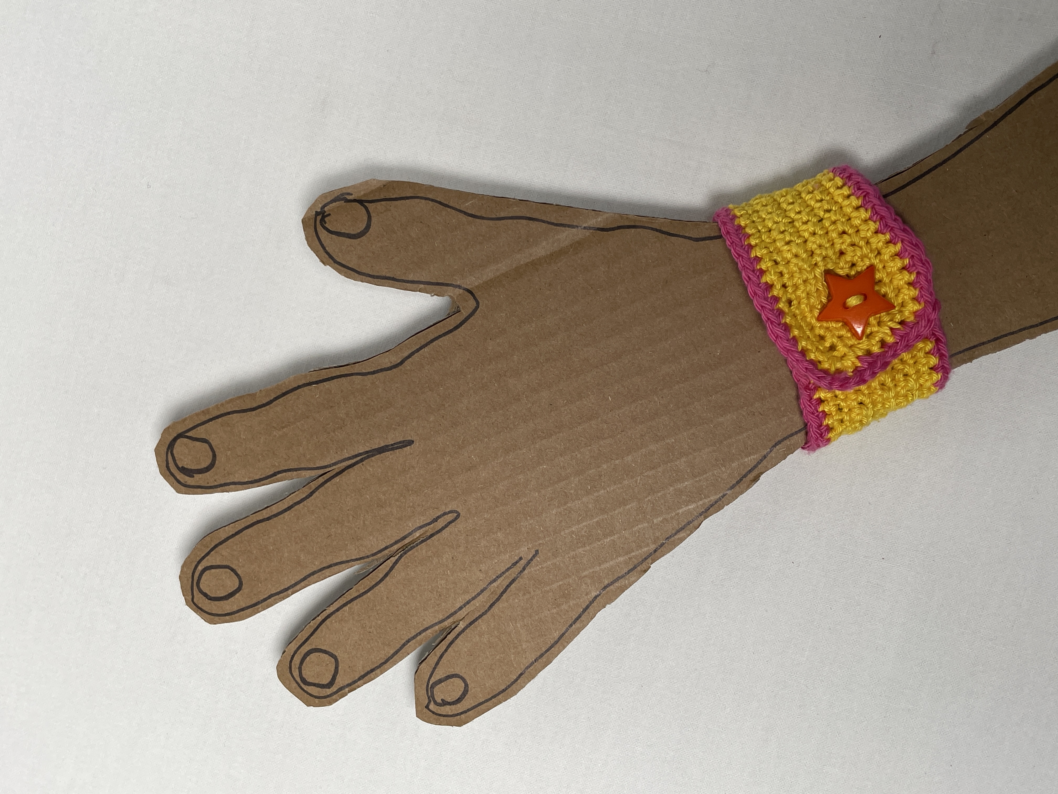 Crochet wristband, yellow and pink, photo 3