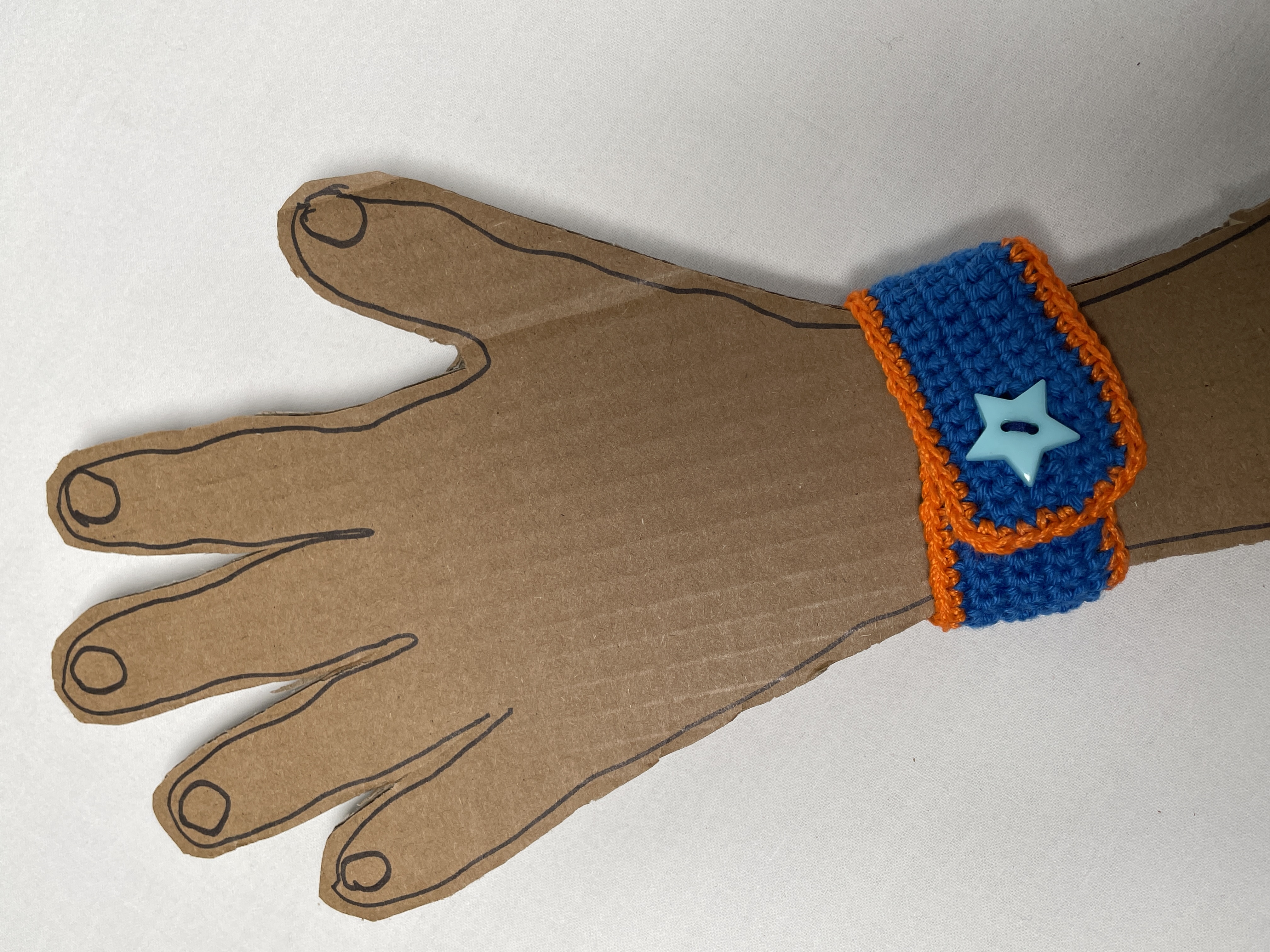 Crochet wristband, blue and orange, photo 2