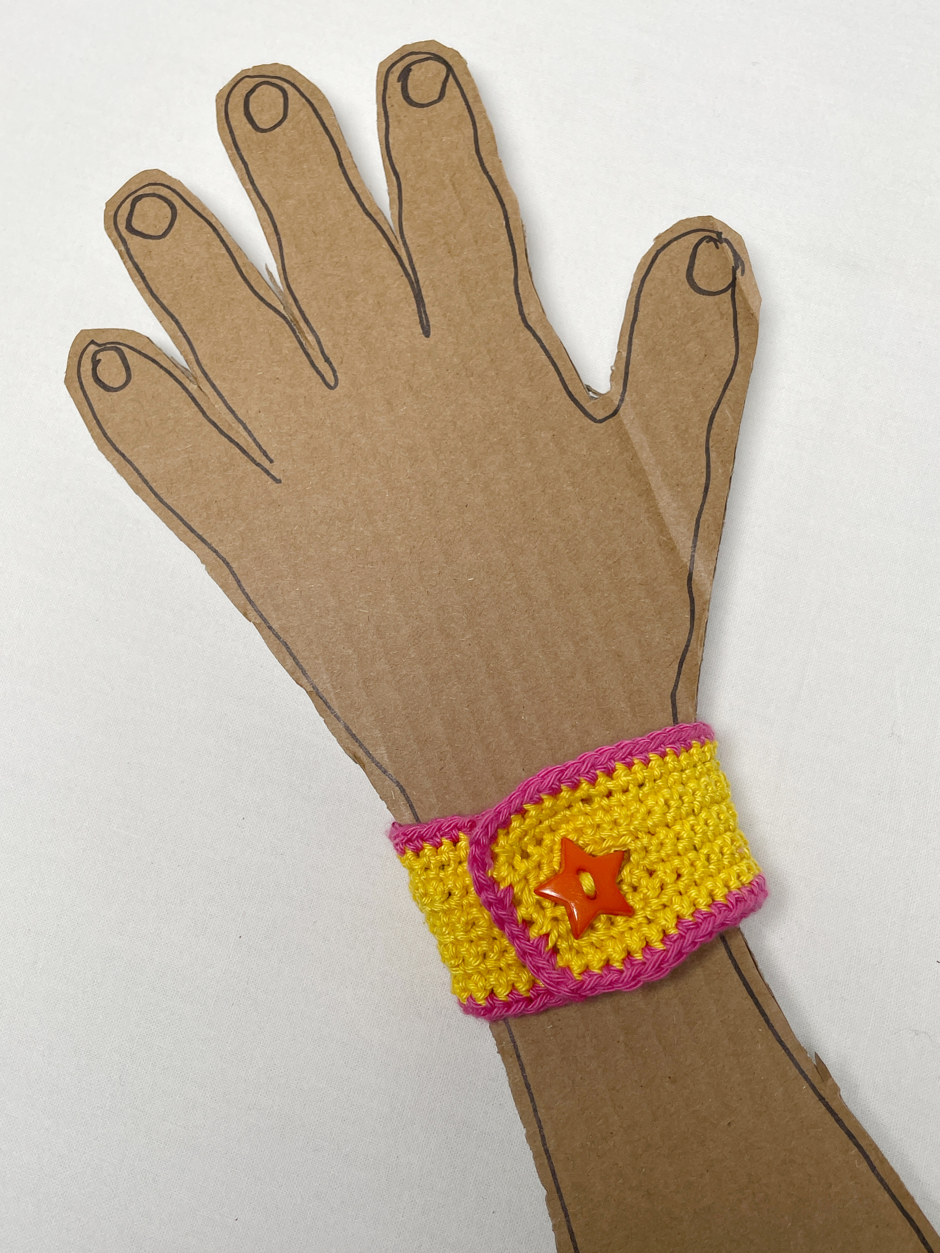 Crochet wristband, yellow and pink, photo 2