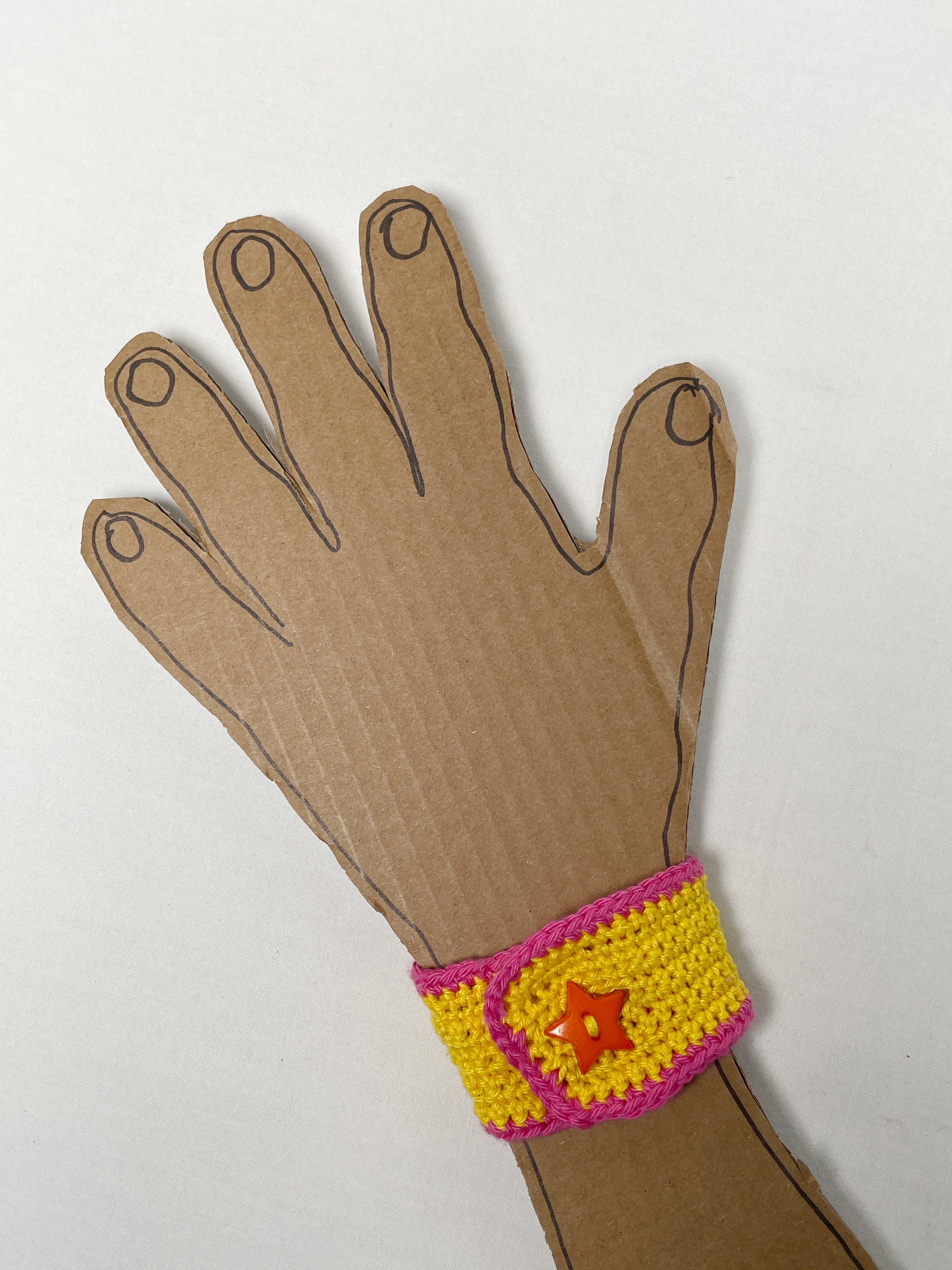 Crochet wristband, yellow and pink, photo 3