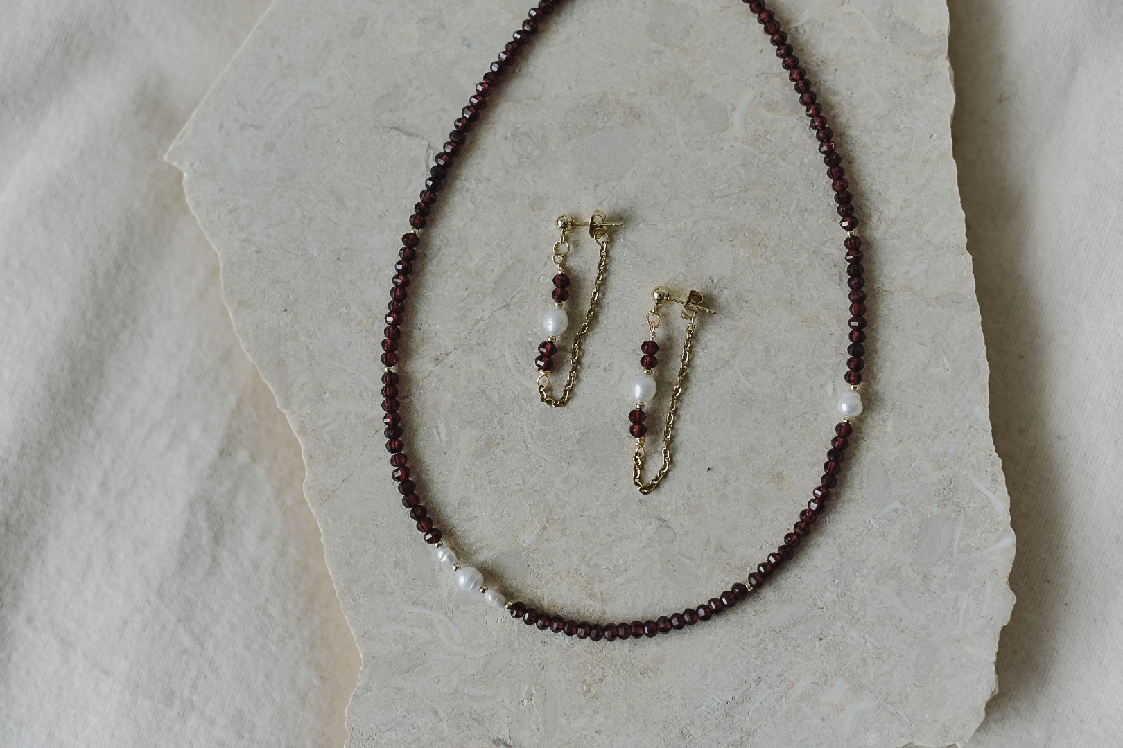 Garnet and Pearl on golden chain earrings