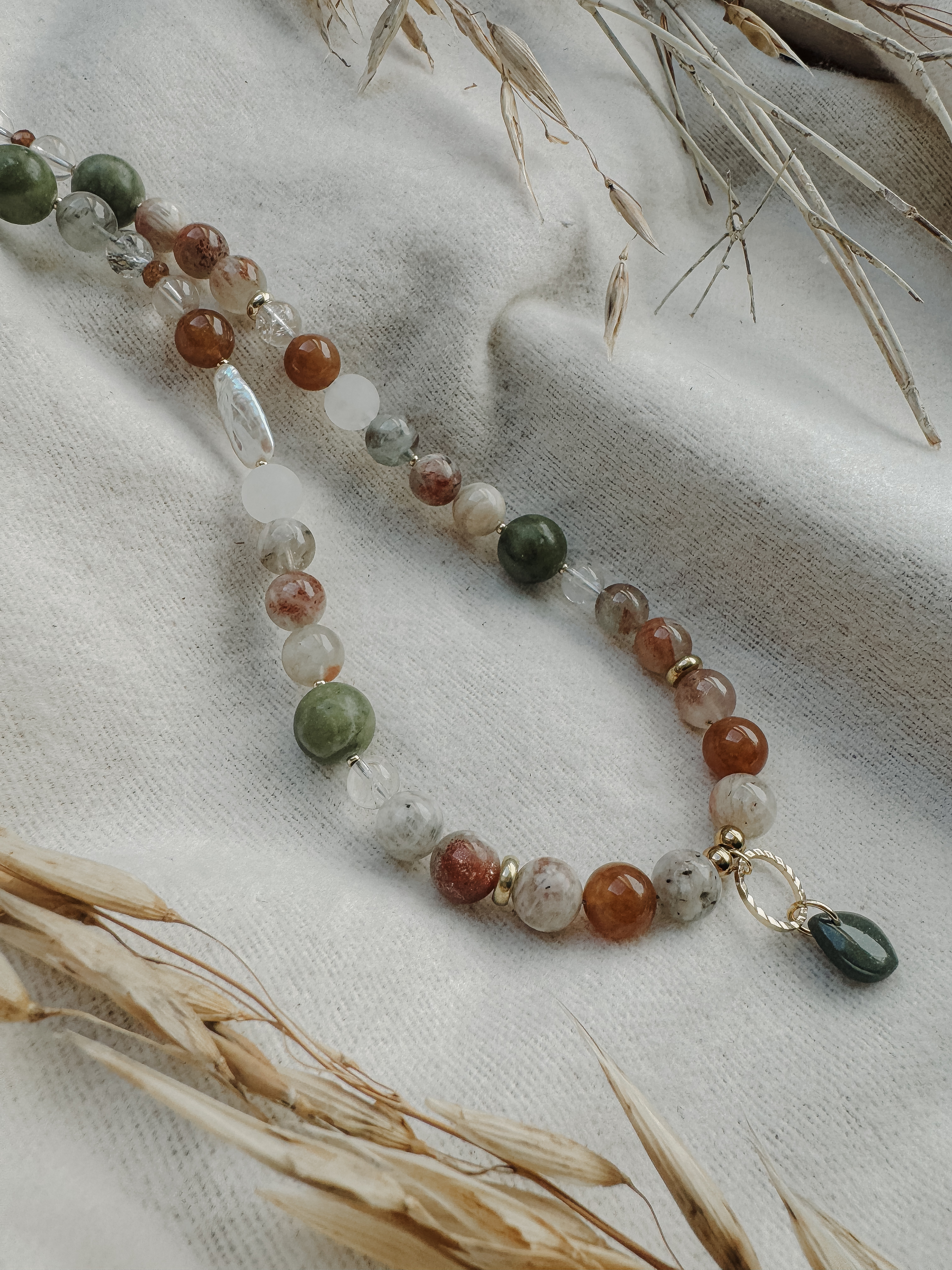 Semiprecious stones necklace with clay pendant
