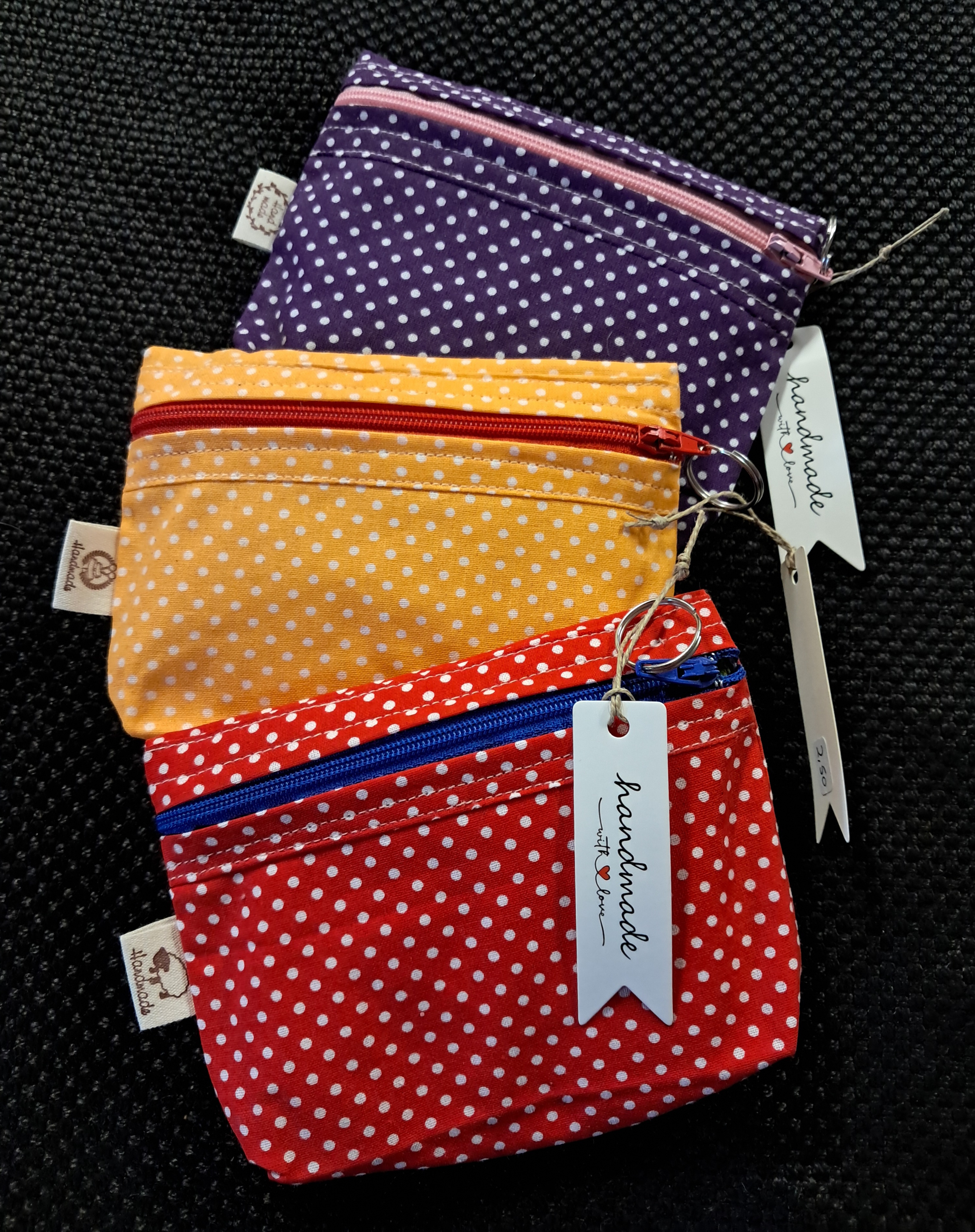 Pack of 3 random colour purses/ make up bags .